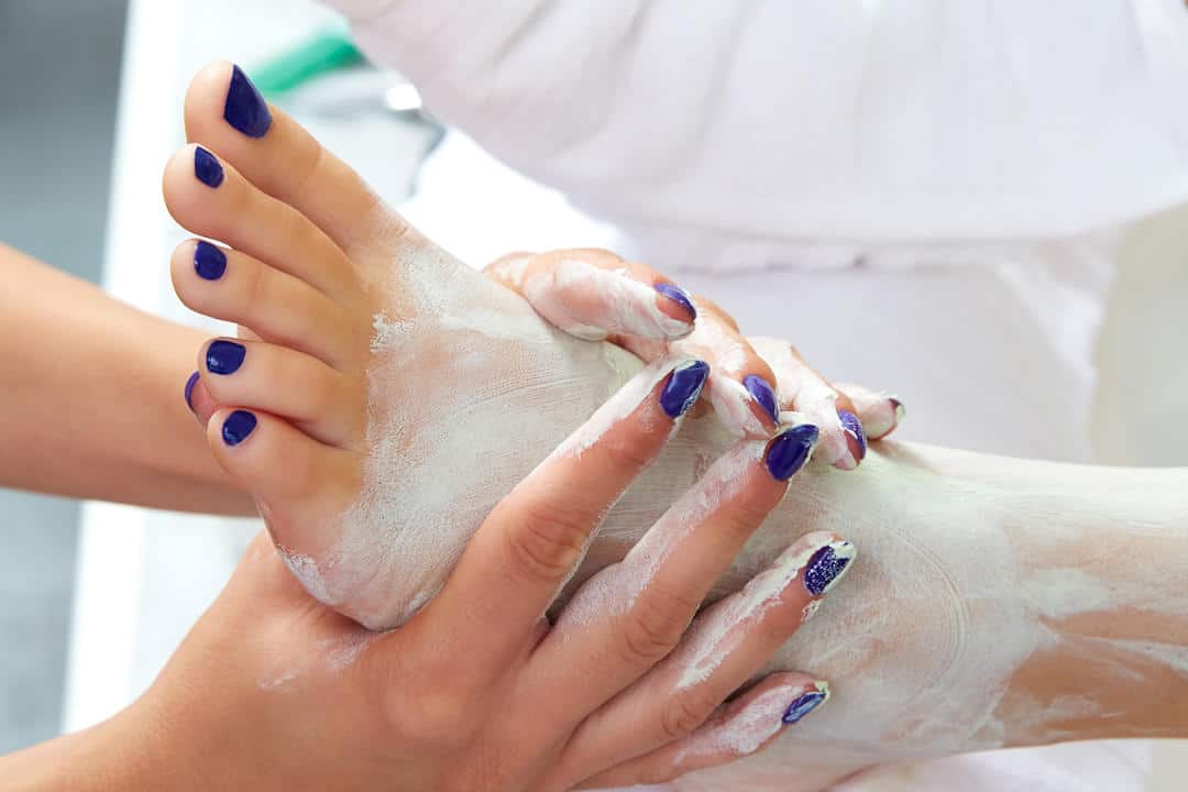 Applying Moisturizer Mask During a Spa Pedicure Applying Moisturizer Mask During a Spa Pedicure